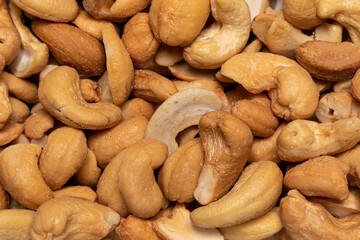 Top view full frame macro shot of cashew nuts.