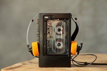 Music listening concept. Vintage cassette tape, audio player and headphones.
