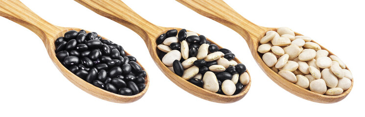 Beans in wooden spoon isolated on white background