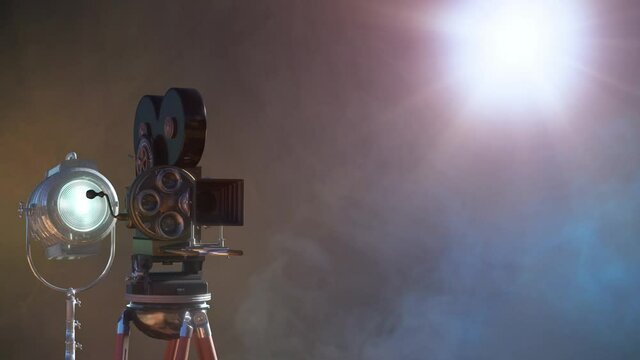 video camera silhouette in the dark banner with blue light, movie or television background render 3d