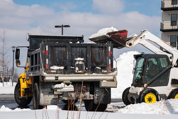 loading snow onto a truck