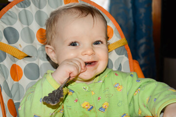 child with a spoon