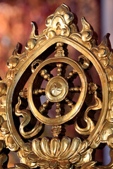 Chua Vinh Nghiem buddhist pagoda.  Dharma Wheel.  Dharmachakra, the Buddhist eight-fold path illustrated in a wheel. Ho Chi Minh City.  Vietnam.  25.02.2017