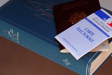 French election.  Polling card, passport and Bible.  France. 22.03.2018