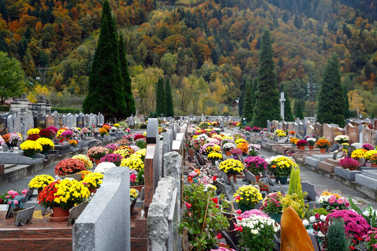 All Saints' Day at a cemetery. Flowers placed to honor deceased relatives.   France.  01.11.2018