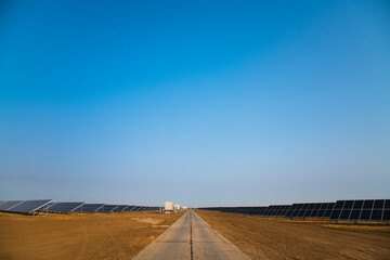 Fototapeta premium Blue solar panels with the sunny sky