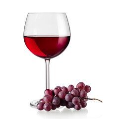 Red wine glass with red grapes, close up