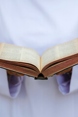 Dominican nun reading the bible. Vietnam.  25.02.2017
