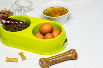 Preparing natural organic food for pets at home. Raw ingredients for pet food in bowl
