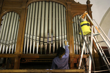 Obraz premium Restoration of Saint Gervais baroque church. Pipe organ repair. France. 17.02.2017