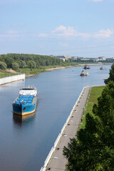 cargo ship ready to enter the lock on Volga river in Russia