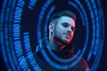 Beautiful stylish man on dark virtual reality background. Cryptocurrency, finance, future technology, innovative ideas concept. Futuristic holographic interface to display data.