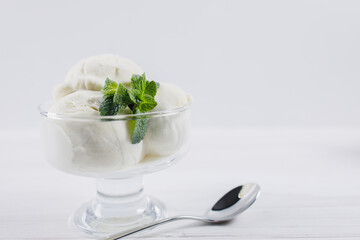 Ice-cream sundae, refreshing vanilla dessert for summertime. Food background with free space