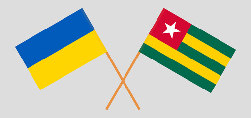 Crossed flags of Ukraine and Togo. Official colors. Correct proportion