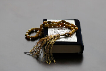 Holy Quran and a muslim prayer beads.  21.09.2018