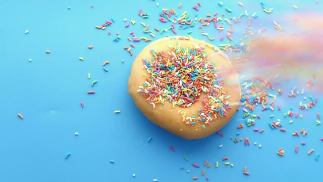 colorful donuts on blue background top down 
