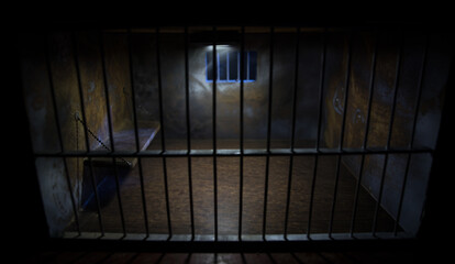 Jail or prison cell. Old grunge prison miniature. Dark prison interior creative decoration. Empty...