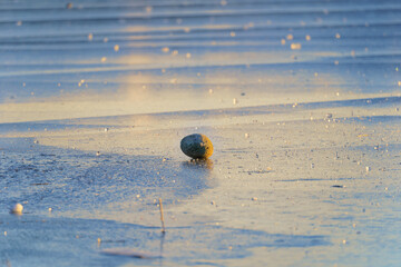 Rock on a icy Lake