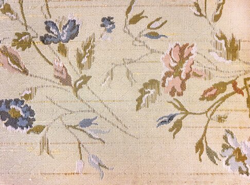 Blush pink old-fashioned upholstery textile with floral design