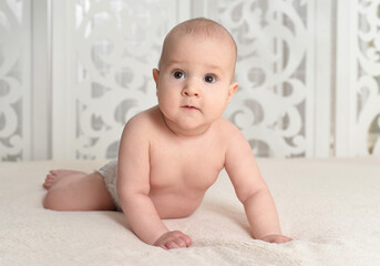 cute little baby boy on bed