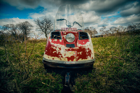 Old Destroyed Snowmobile