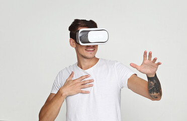 The man with glasses of virtual reality on white isolated background.
