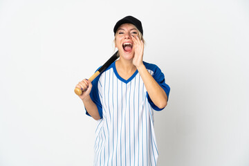 Young Russian woman playing baseball isolated on white background shouting with mouth wide open