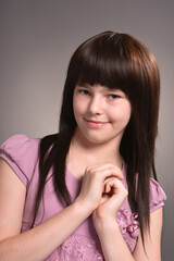 Fototapeta premium Girl with dark hair posing in studio