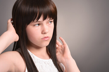 Cute girl with dark hair  posing