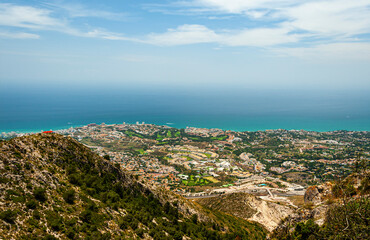 Fototapeta na wymiar Panoramic view of the town of Benalmadena and Costa del Sol coastline, Malaga Province, Spain