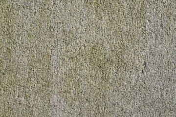 Fototapeta premium A wall of granite stone as a background.