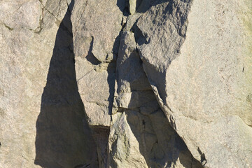 Granite rocks in the sun as a natural background.
