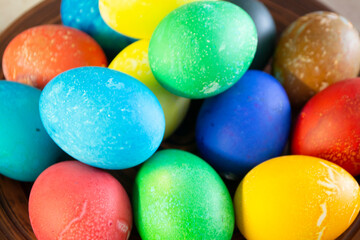 Colorful Easter eggs background close up texture surface