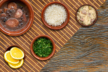 Brazilian feijoada. Typical Brazilian food with black beans and pork. View from the top