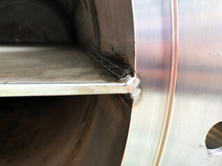 Clean the area where the heat exchanger gasket is attached.