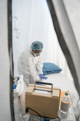 Fototapeta na wymiar Woman doing daily routine at the isolation unit in hospital during pandemic
