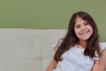 the happy girl in the couch