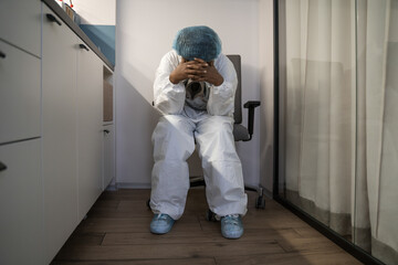 Depressed sad multiracial doctor feeling fatigue burnout stress