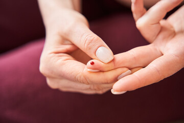 Woman checking morning insulin sugar level