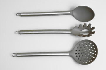 Tools for cook kitchen equipament dishes utensil dinner fork metal plastic isolated white background silver food 