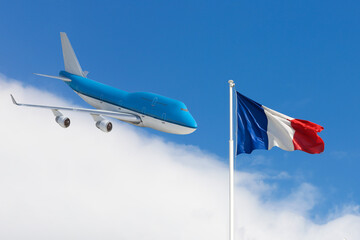 Concept travel to France. The flag of France is on blue sky. The plane is on the left. - 417258189