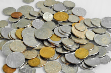 Many  vintage coins from different countries Euro Dollar Real Japan metal gold financial close economic cents pound finance business monetary collection money