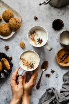 Gingerbread latte with gingersnap cookie.