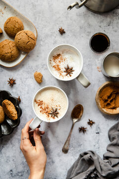Gingerbread latte with gingersnap cookie.