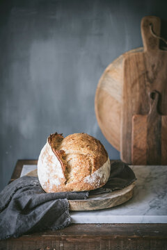 Homemade sourdough bread in a rustic kitchen
