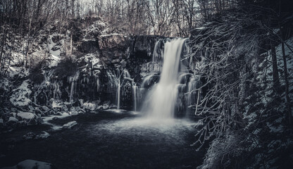 Waterfall at winter in the forest