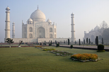 In Agra, India, visitors enjoy the Taj Mahal when early-morning mist is lingering and there is a lack of crowds.