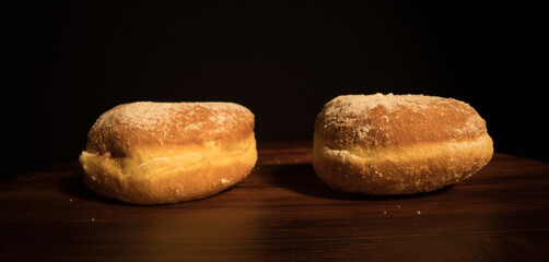 Close up view over fresh baked doughnuts - macro shot