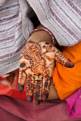 Henna design on hand of Rathwa tribal woman, Gujarat, India
