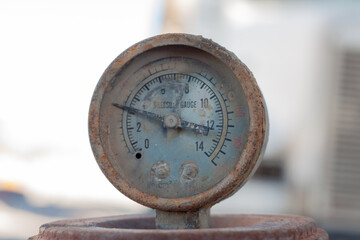 old gauge used to measure pressure in old factories.
